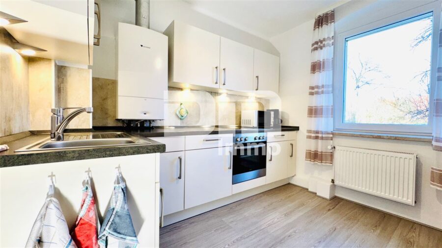 Modernisiertes Ein- bis Zweifamilienhaus mit Maisonettebereich in Traumlage - EG Küche mit EBK